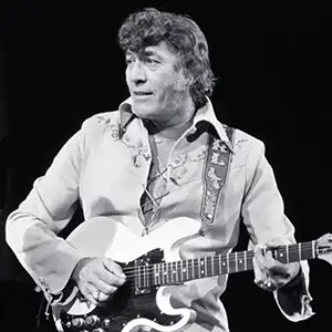 Carl Perkins with guitar