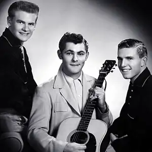 Charlie Feathers With Jody and Jerry posing with guitar